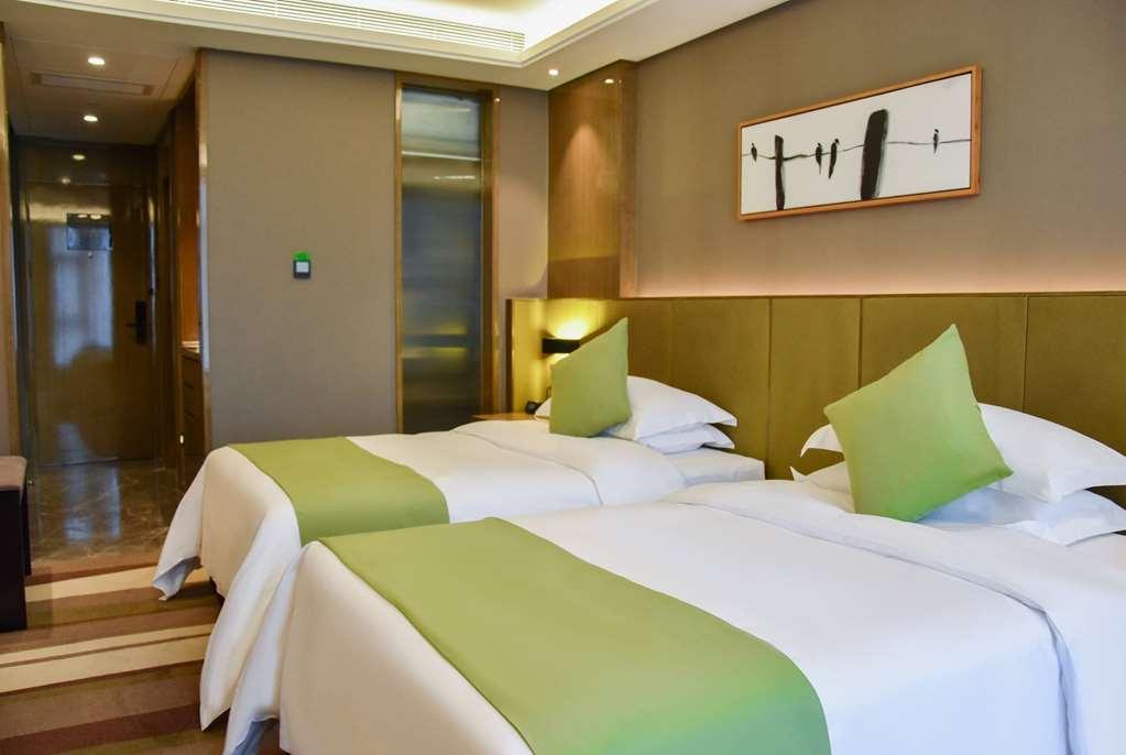 Leshan Ramada Hotel Habitación foto