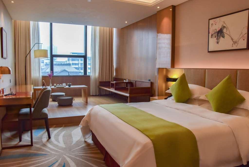 Leshan Ramada Hotel Habitación foto