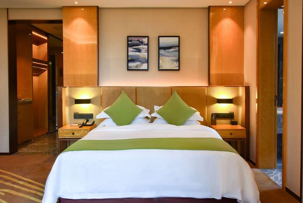 Leshan Ramada Hotel Habitación foto