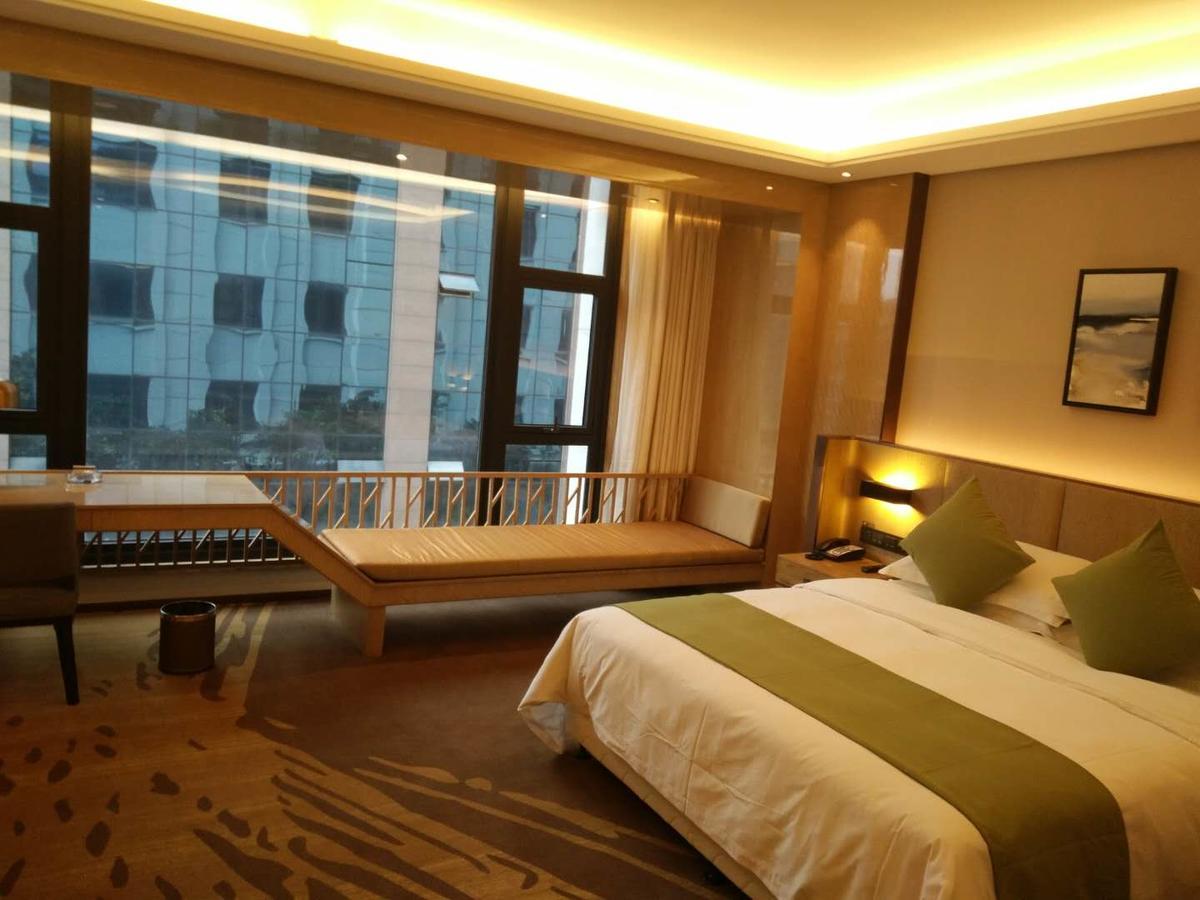 Leshan Ramada Hotel Habitación foto