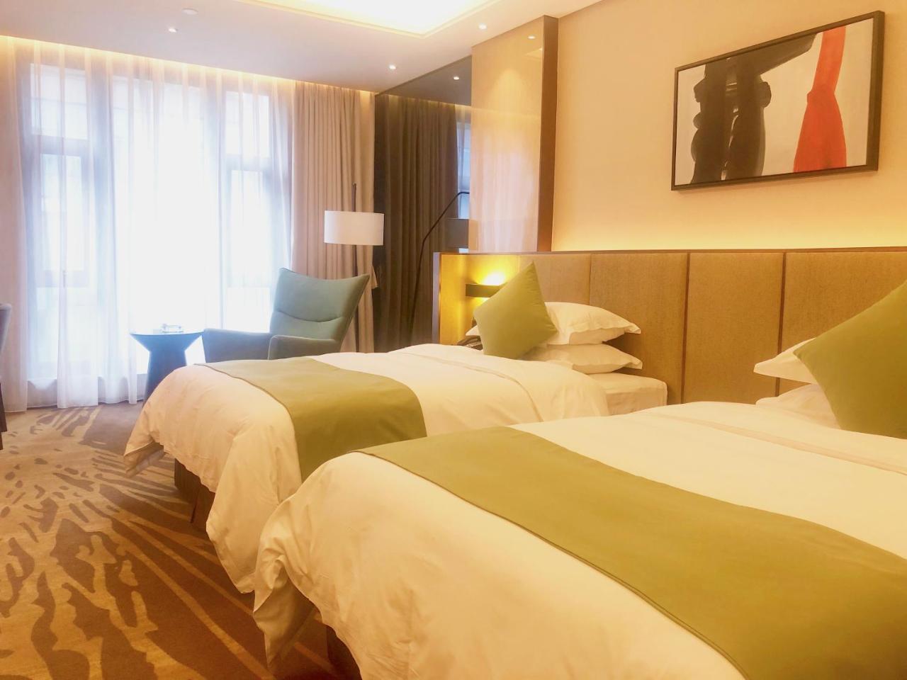 Leshan Ramada Hotel Exterior foto