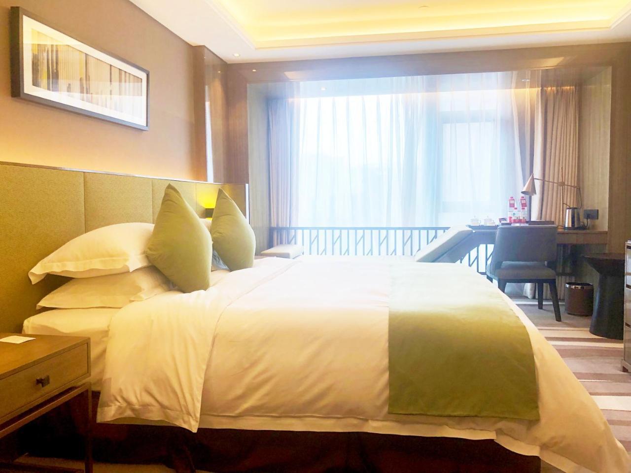 Leshan Ramada Hotel Exterior foto